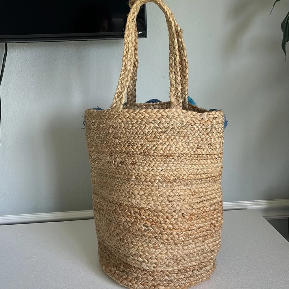 - Anthropologie Jute Braided Tote bag with  Pom Pom